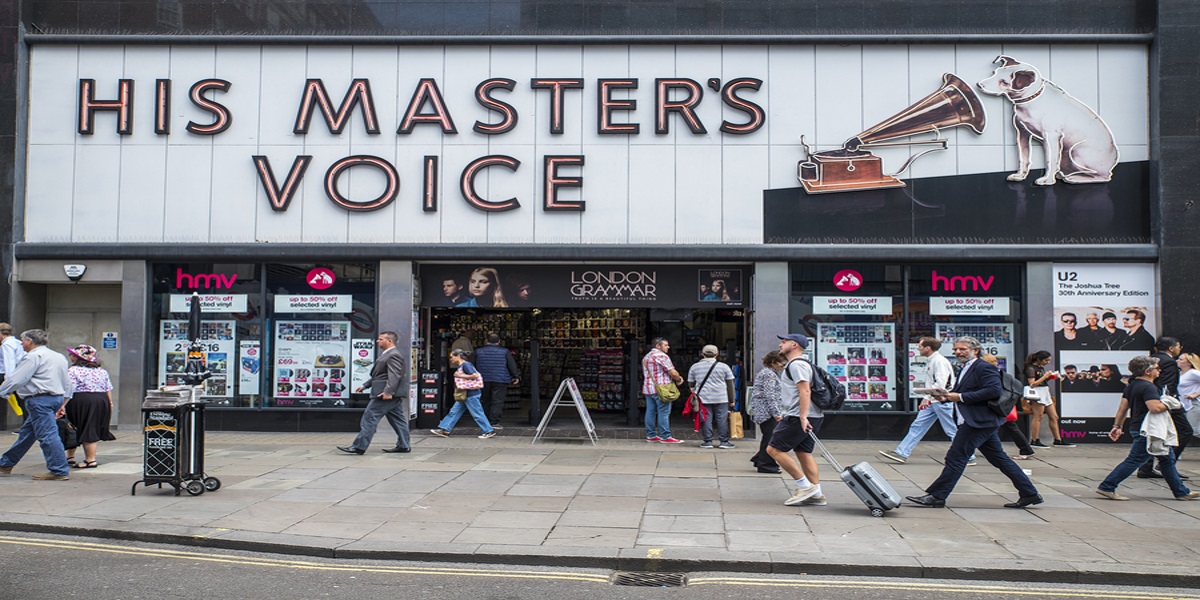 Photo of HMV's shop front in London. Shop title reads His Master's Voice with logo of a dog listening to a gramaphone. Illustrating concern over it going into administration and if their vouchers will be honoured.