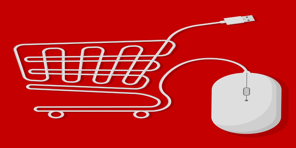 Shopping cart created with white computer mouse usb wire on bright red background. Showing effects digital retail is having on UK high streets.