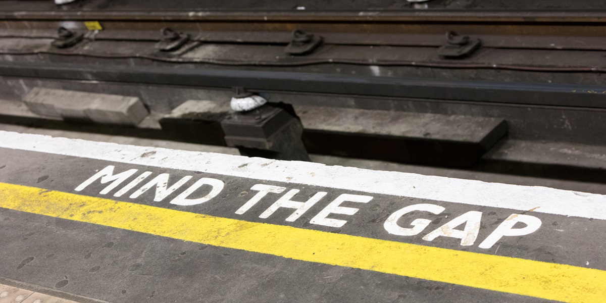 Photo of the Mind the Gap warning sign painted on the London Underground platforms, as illustration of the UK's tax gap.